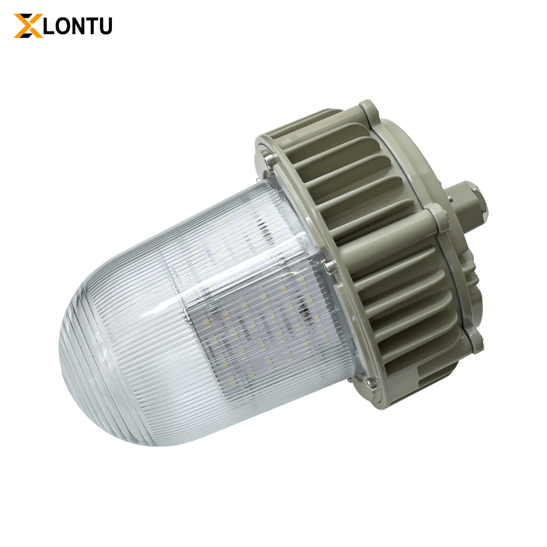 Horizontal side tilt view ATEX Explosion Proof LED Tri-Proof Light, side shot of striped PC lampshade & finned aluminum heat sink industrial lamp